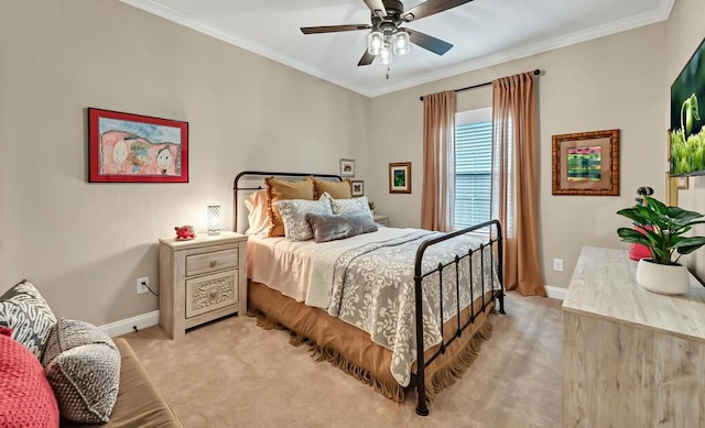 bedroom featuring ceiling fan, light colored carpet, and ornamental molding