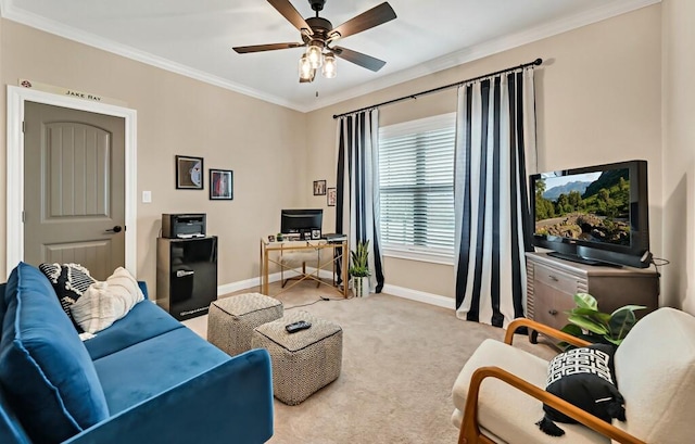 living room with ceiling fan, ornamental molding, and light carpet