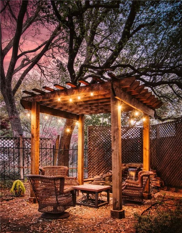 view of home's community with a pergola