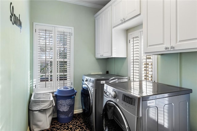 washroom with cabinets, separate washer and dryer, and ornamental molding