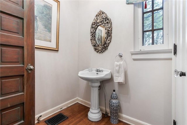 bathroom featuring hardwood / wood-style flooring