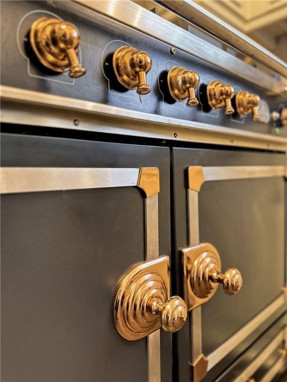 room details featuring stainless steel electric range oven