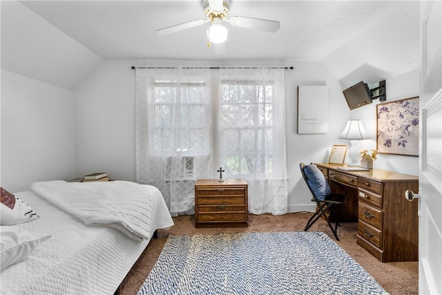 carpeted bedroom featuring ceiling fan and lofted ceiling