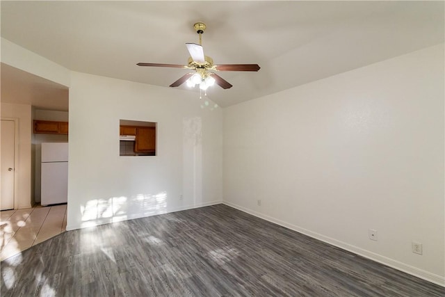 unfurnished room featuring hardwood / wood-style flooring and ceiling fan