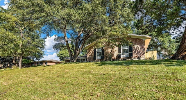 view of front of home with a front yard