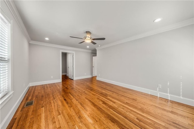 unfurnished room with ceiling fan, ornamental molding, and light hardwood / wood-style flooring