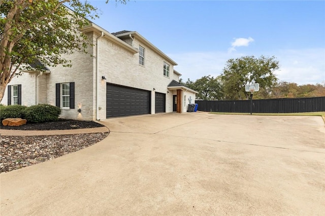 view of property exterior featuring a garage