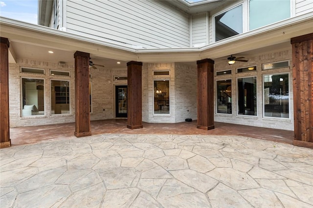 view of patio / terrace featuring ceiling fan