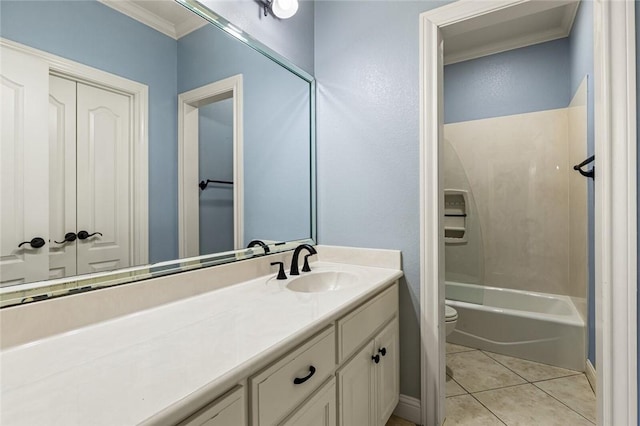 full bathroom featuring vanity, tile patterned floors, crown molding, toilet, and shower / bathing tub combination