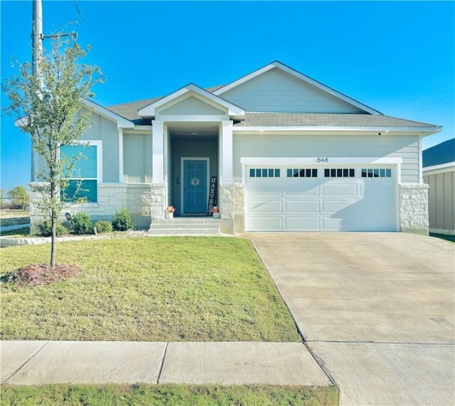 craftsman-style house with a front yard and a garage