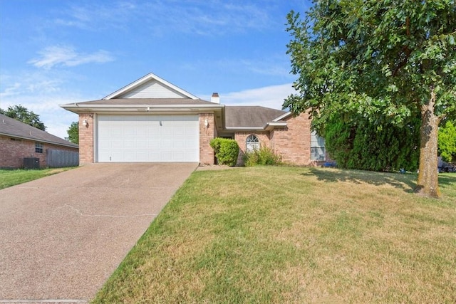 single story home with a garage, a front lawn, and central air condition unit