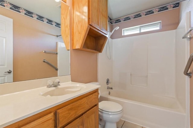 full bathroom featuring tile patterned flooring, vanity, toilet, and tub / shower combination