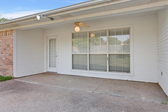 view of patio / terrace featuring ceiling fan