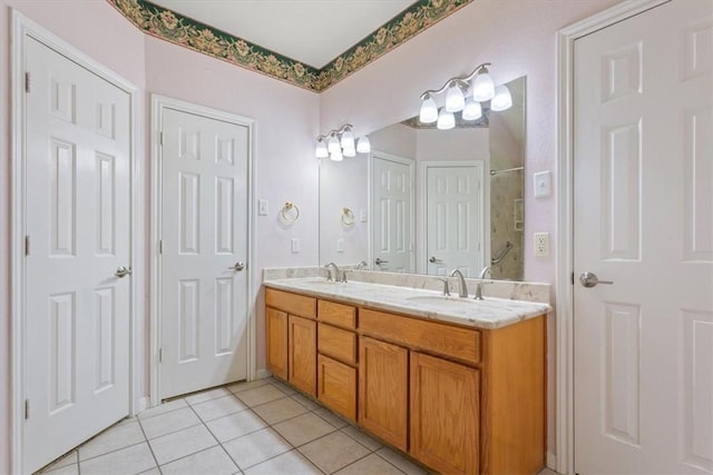 bathroom with vanity and tile patterned floors