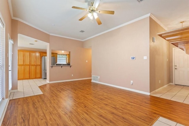 unfurnished living room featuring light hardwood / wood-style floors and a wealth of natural light