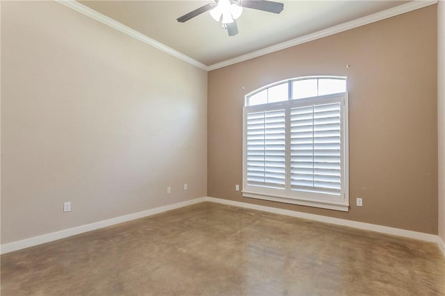 carpeted spare room featuring ceiling fan and ornamental molding