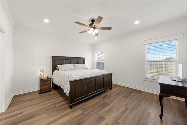 bedroom featuring recessed lighting, baseboards, dark wood-style floors, and ornamental molding