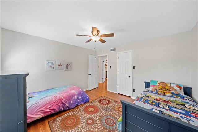 view of patio / terrace featuring ceiling fan and a pool