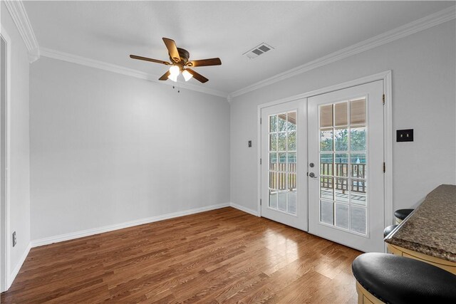 bathroom with vanity, ornamental molding, and washer / clothes dryer