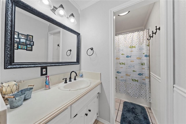 bathroom featuring vanity, tile patterned floors, walk in shower, and ornamental molding