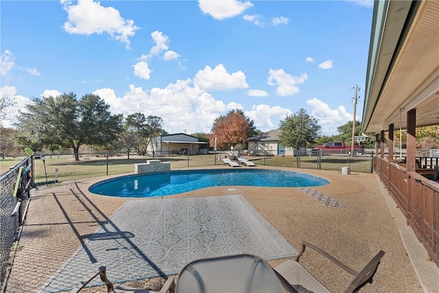 view of pool with a patio area