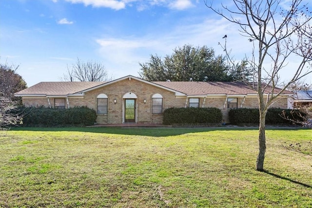 ranch-style house with a front yard