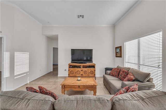 tiled living room featuring ornamental molding