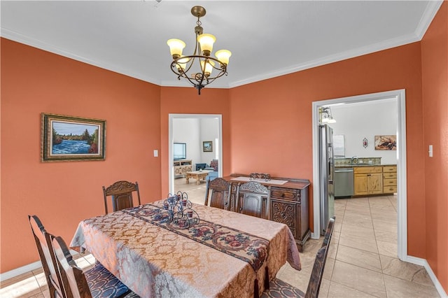 tiled dining area featuring sink, ornamental molding, and an inviting chandelier