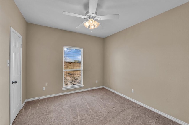 empty room with light carpet and ceiling fan