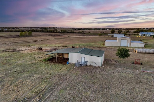 aerial view at dusk with a rural view