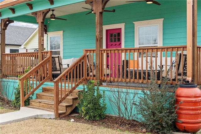 wooden deck featuring ceiling fan