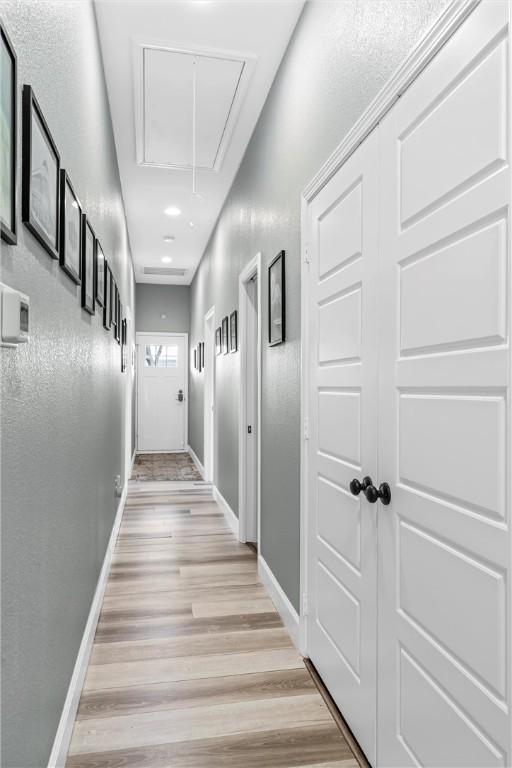 hallway featuring light hardwood / wood-style floors