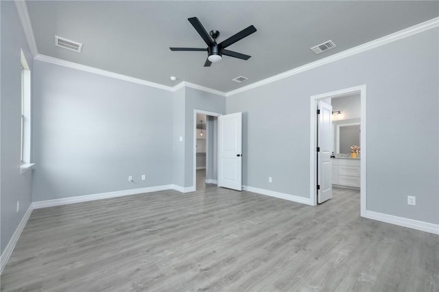 unfurnished bedroom with ensuite bathroom, light hardwood / wood-style floors, ornamental molding, and ceiling fan