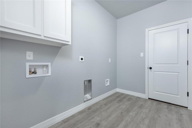 laundry room with washer hookup, electric dryer hookup, cabinets, and light wood-type flooring