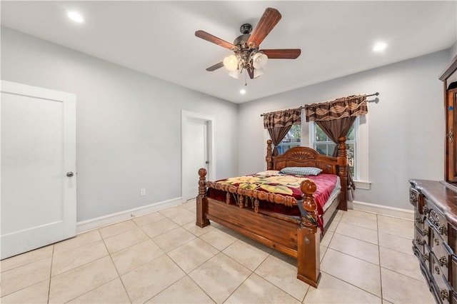 tiled bedroom featuring ceiling fan