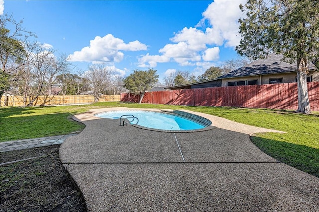 view of pool with a patio, a diving board, and a lawn