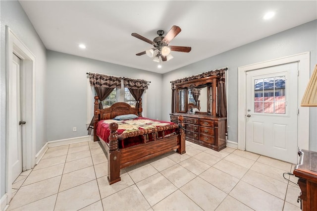 bedroom featuring light tile patterned floors and ceiling fan