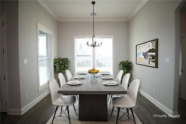 dining area with dark wood-type flooring and a healthy amount of sunlight