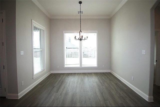 unfurnished dining area with dark wood-type flooring, a healthy amount of sunlight, and ornamental molding