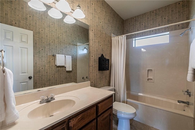 full bathroom featuring tile patterned flooring, vanity, a notable chandelier, toilet, and shower / bathtub combination with curtain