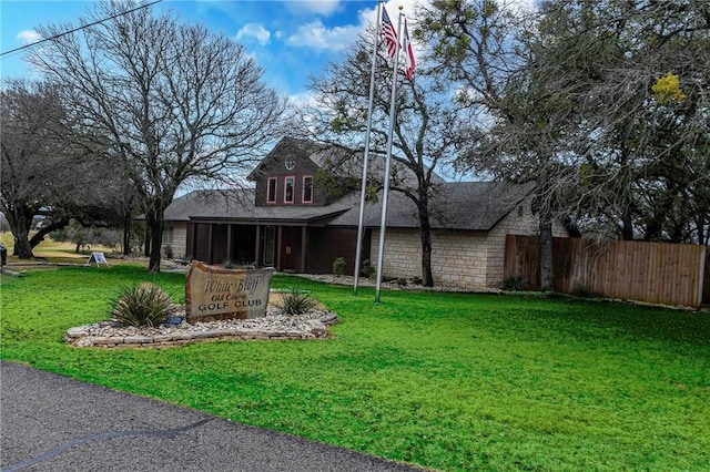 view of front of house with a front lawn