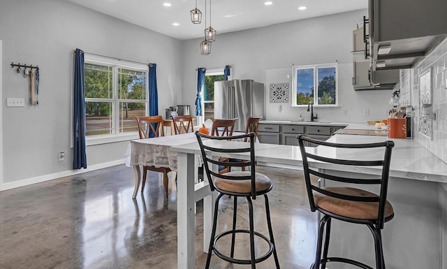 dining room featuring sink