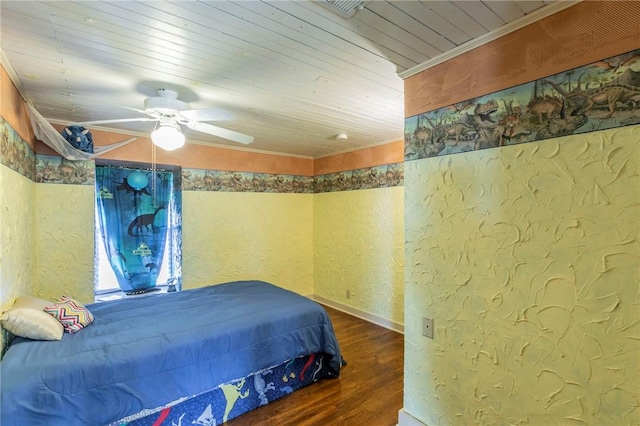 bedroom featuring wood finished floors, ceiling fan, wood ceiling, crown molding, and a textured wall