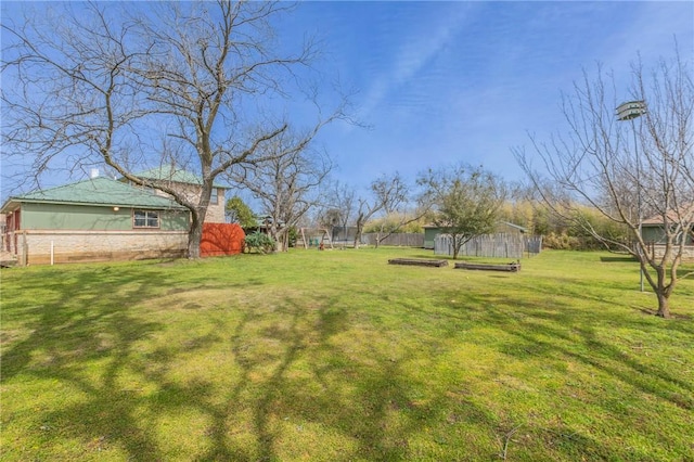 view of yard featuring fence