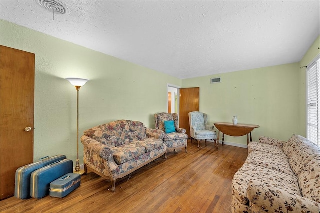 living room with wood-type flooring