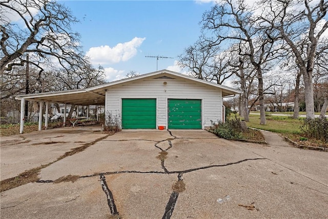 garage with a carport