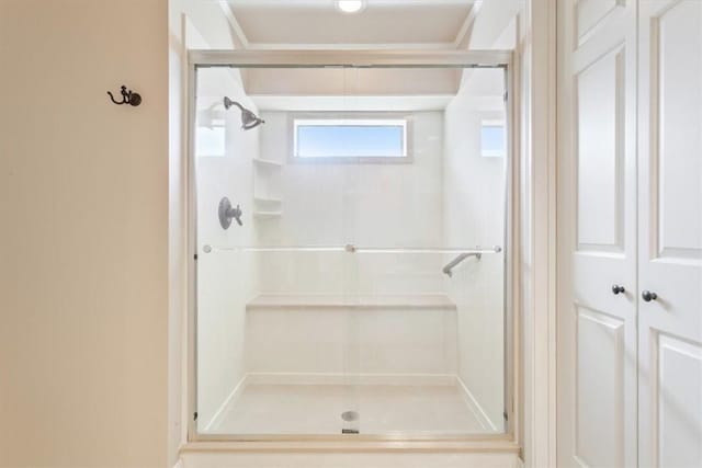 bathroom with a stall shower