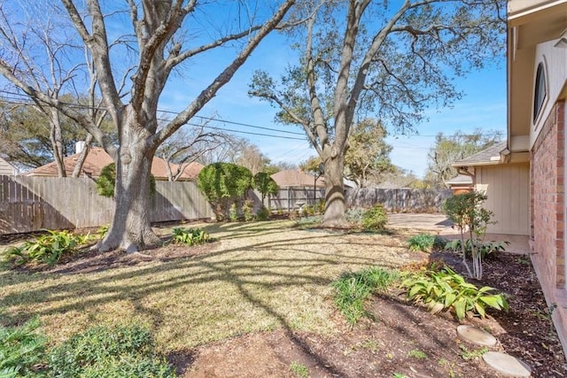 view of yard with fence