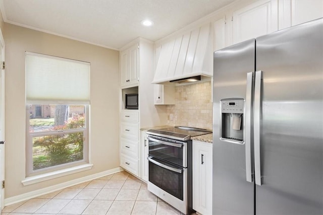 kitchen featuring backsplash, custom exhaust hood, light tile patterned flooring, white cabinets, and stainless steel appliances