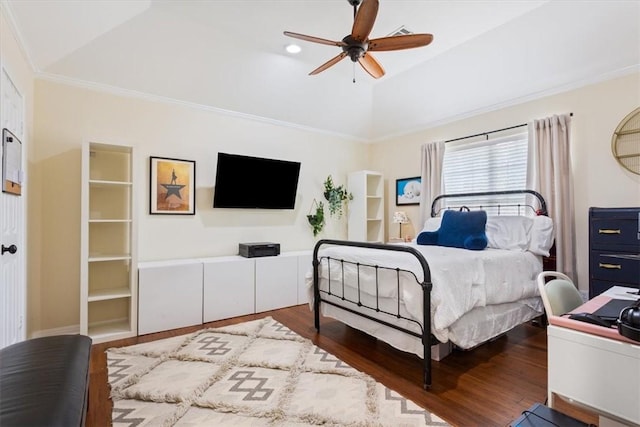 bedroom with ornamental molding, a ceiling fan, and wood finished floors